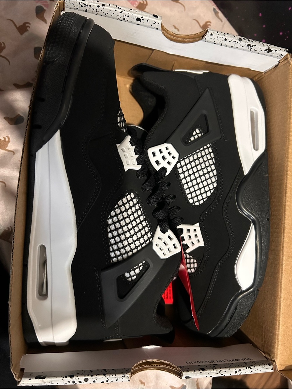 Jordan Black and White Retro High-Top Sneakers